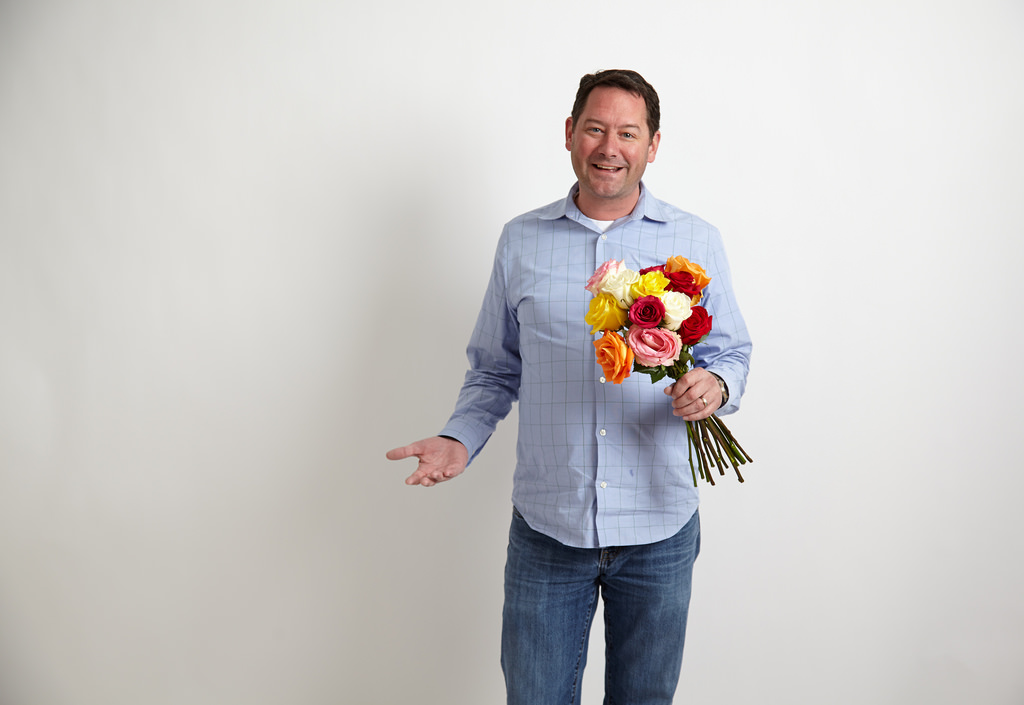 Man holding flowers